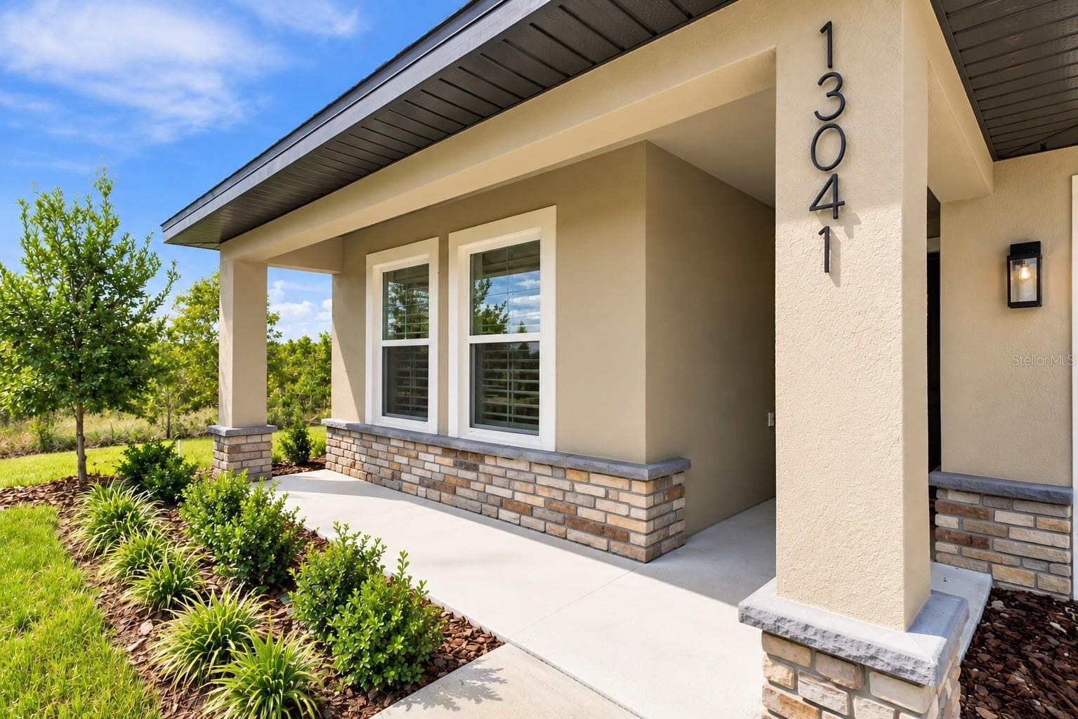 Front porch - 13041 SCISSORBILL AVE, WEEKI WACHEE