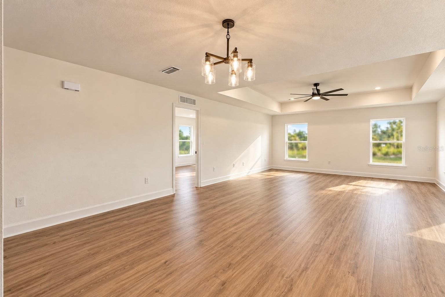 Dining room/Living room combo - 13041 SCISSORBILL AVE, WEEKI WACHEE