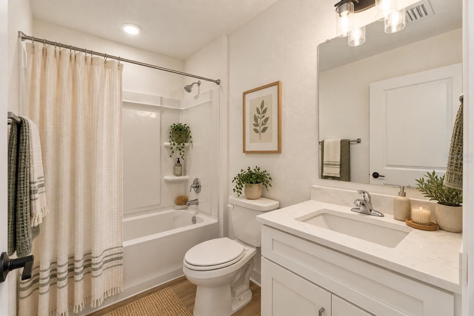 Virtually stagedGuest bathroom - 13041 SCISSORBILL AVE, WEEKI WACHEE