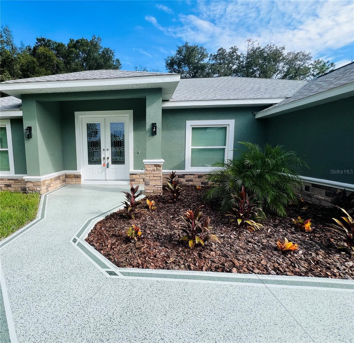 Enhanced Landscapingand walkway coating - 8277 SE 158TH ST, SUMMERFIELD