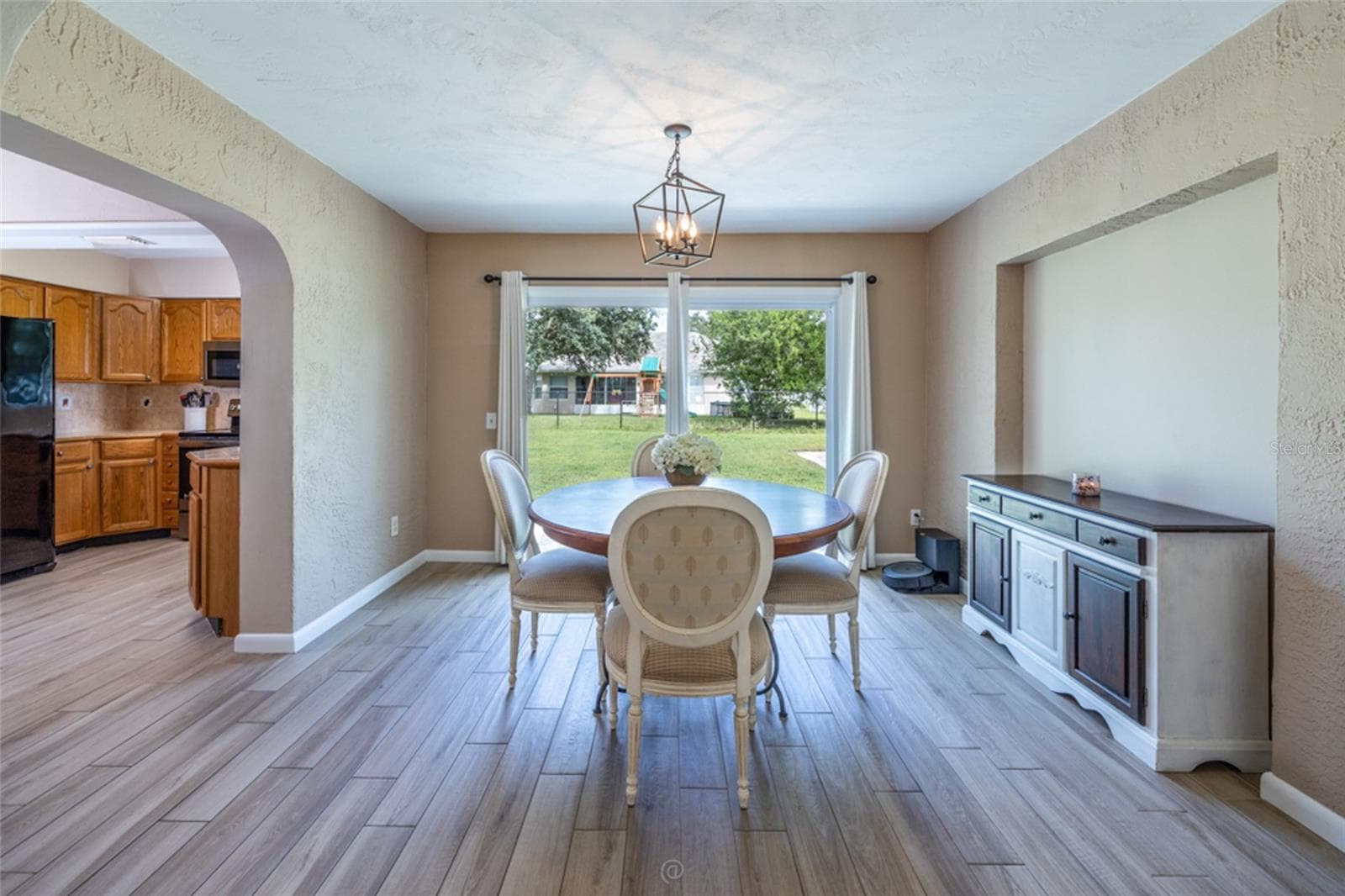 Dining Room with sliding glass doors to back yard - 31 PINELYNN DR, PALM COAST