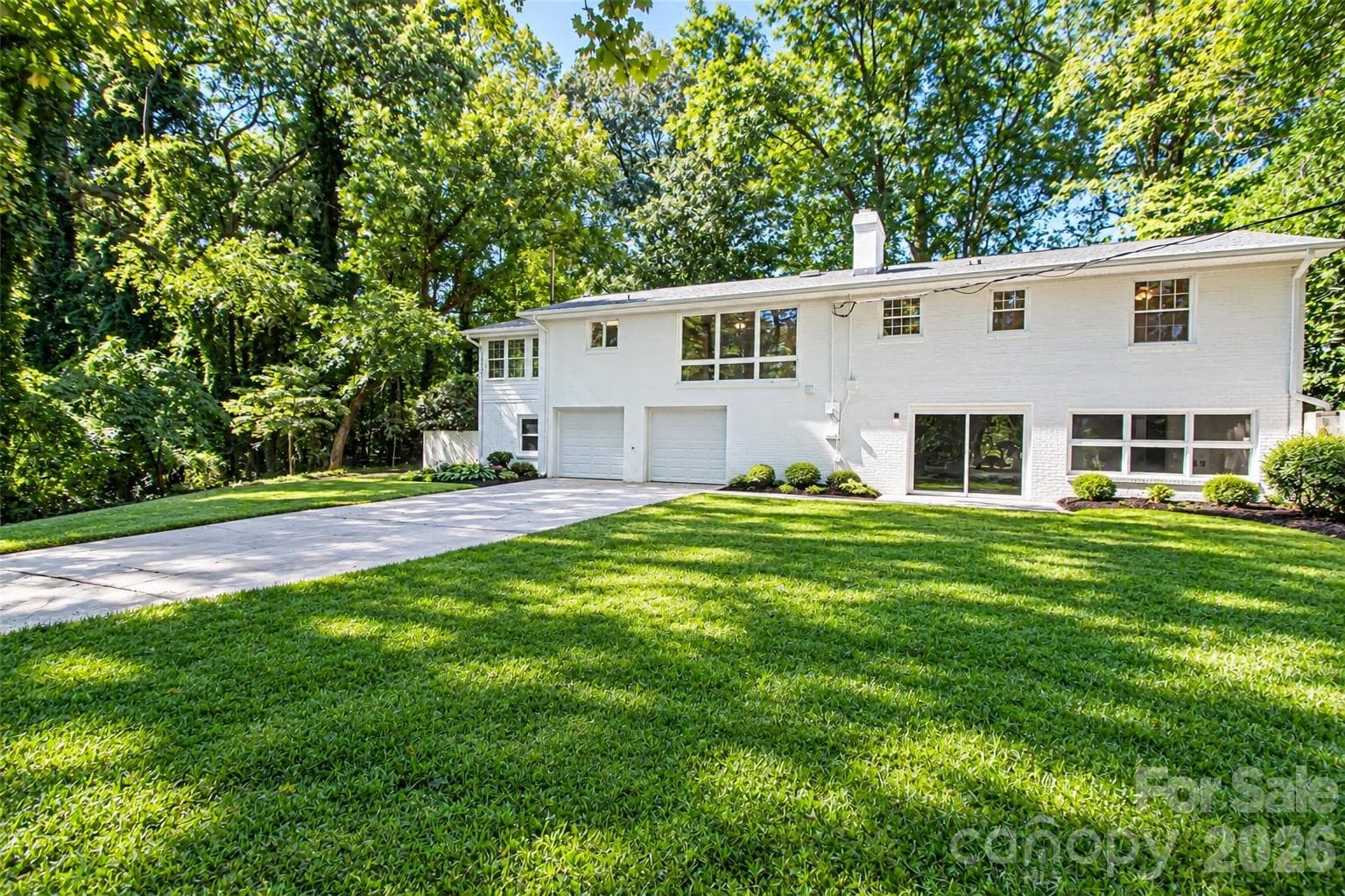 2 car garage plus a large separate room next to garage that is perfect for storage or workshop. - 7400 Oakwood Lane, Charlotte