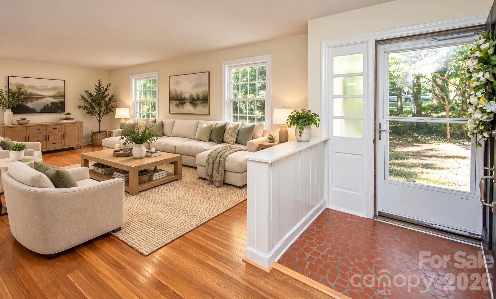 Spacious living area featuring an expansive open floor plan designed to accommodate a variety of furniture arrangements and décor styles.  Photo has been decorated by AI to show what it could look like furnished. - 7400 Oakwood Lane, Charlotte