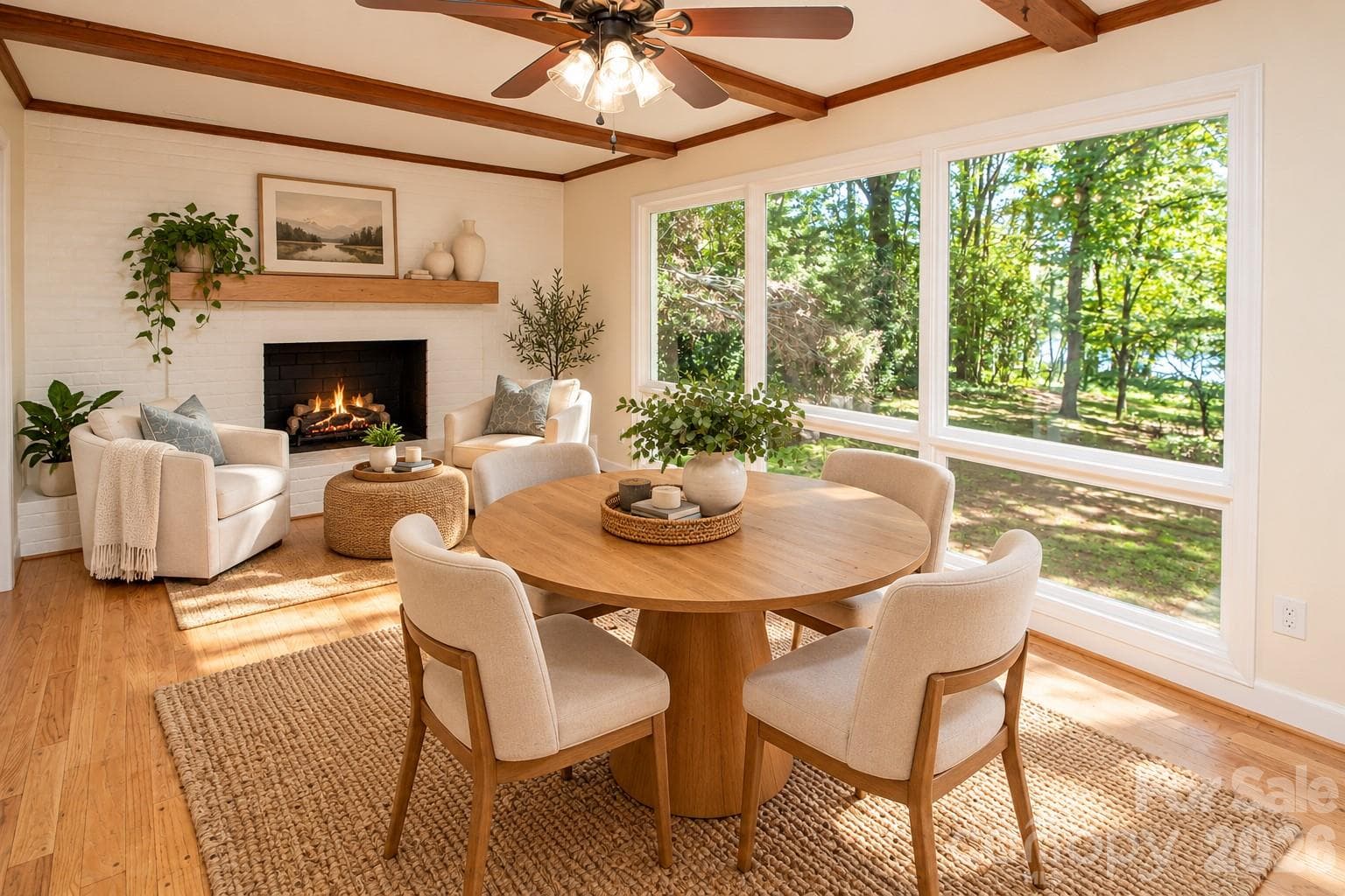 Beautiful dining area and sitting room with fireplace located adjacent to the kitchen. - 7400 Oakwood Lane, Charlotte