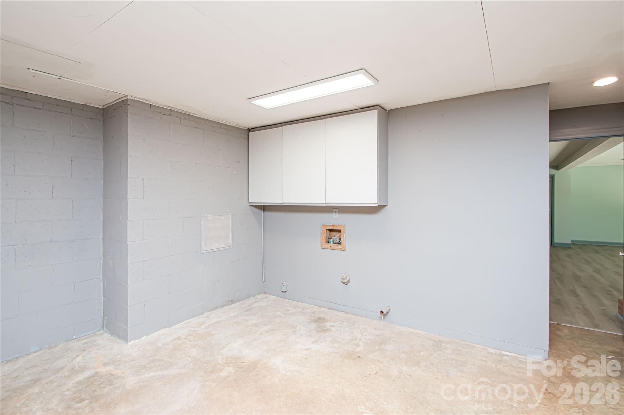 Laundry area is located in the garage. - 7400 Oakwood Lane, Charlotte