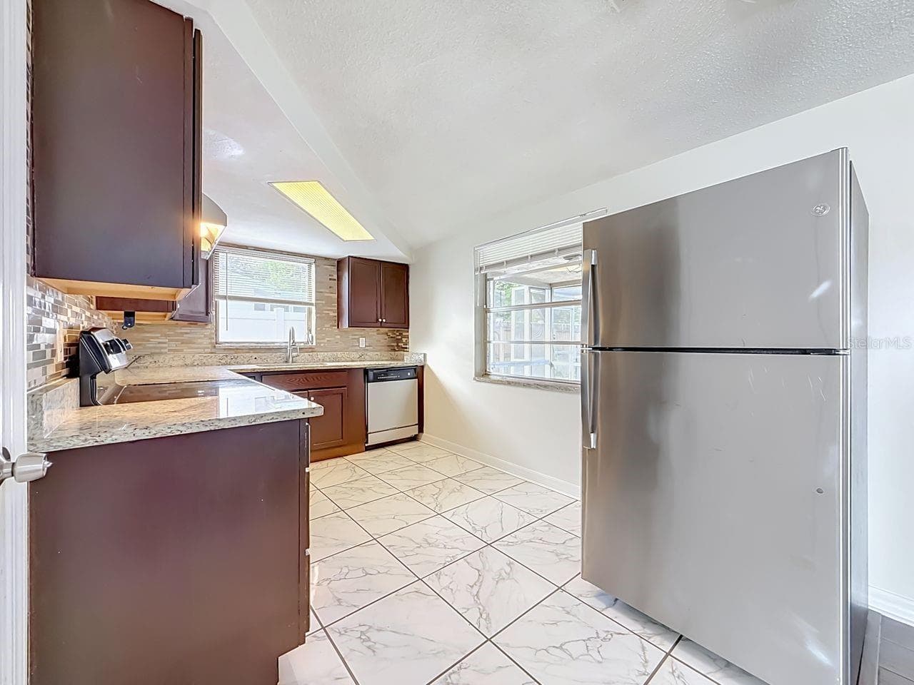 Single Family Residence at 9015 COLLAGE LN, PORT RICHEY, photo 8 of 44