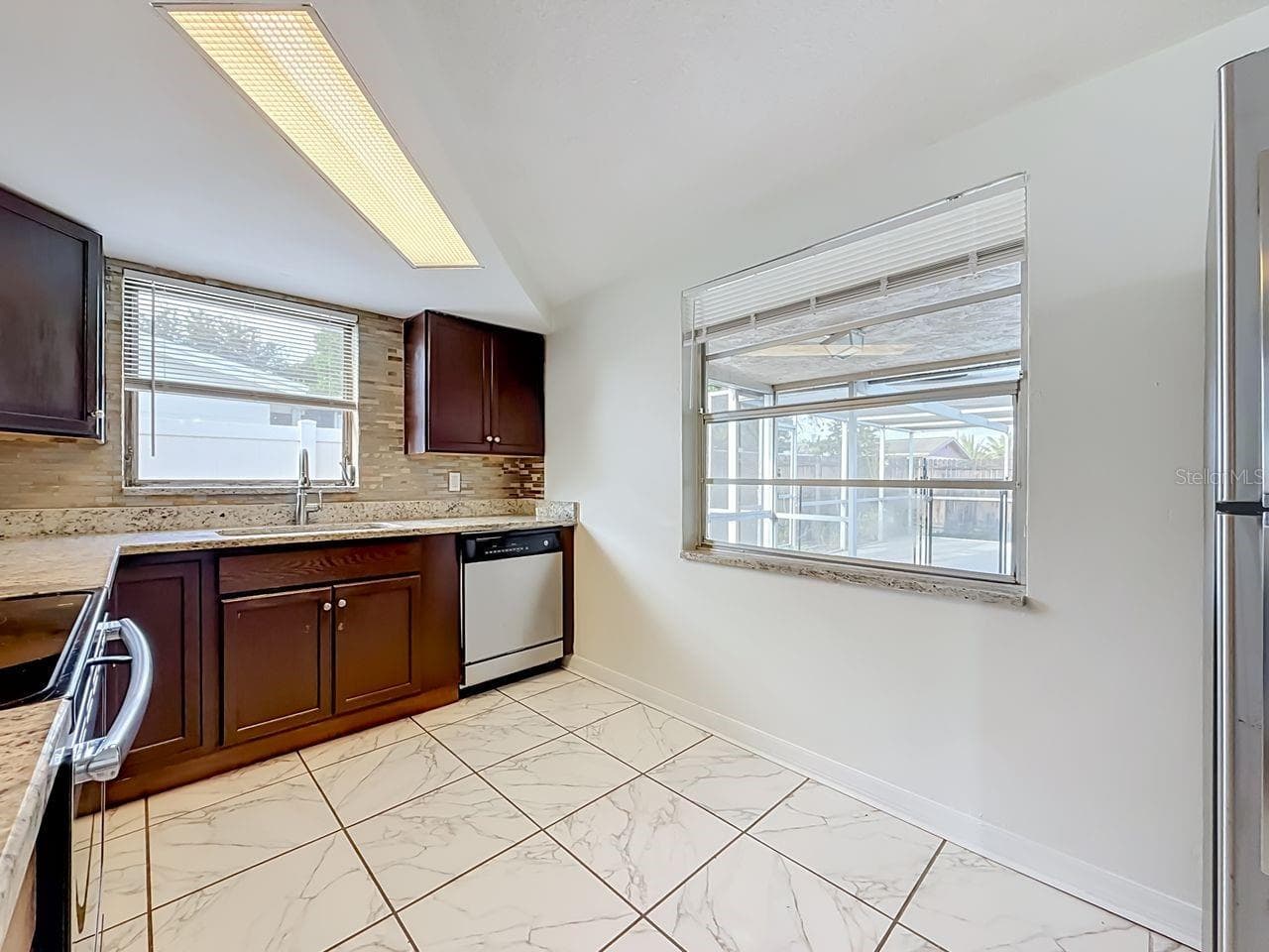 Single Family Residence at 9015 COLLAGE LN, PORT RICHEY, photo 9 of 44
