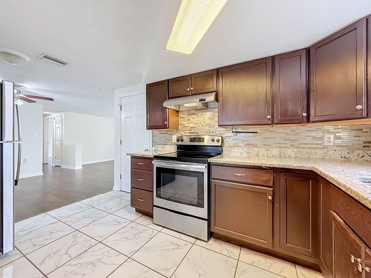Single Family Residence at 9015 COLLAGE LN, PORT RICHEY, photo 11 of 44
