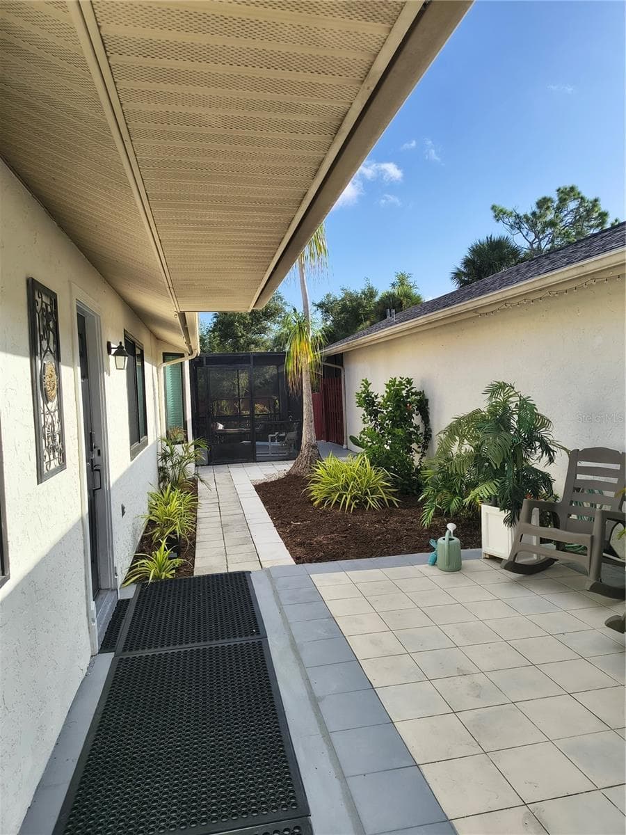 COURTYARD ENTRY-VIEW 1 - 255 BOUNDARY BLVD #104, ROTONDA WEST