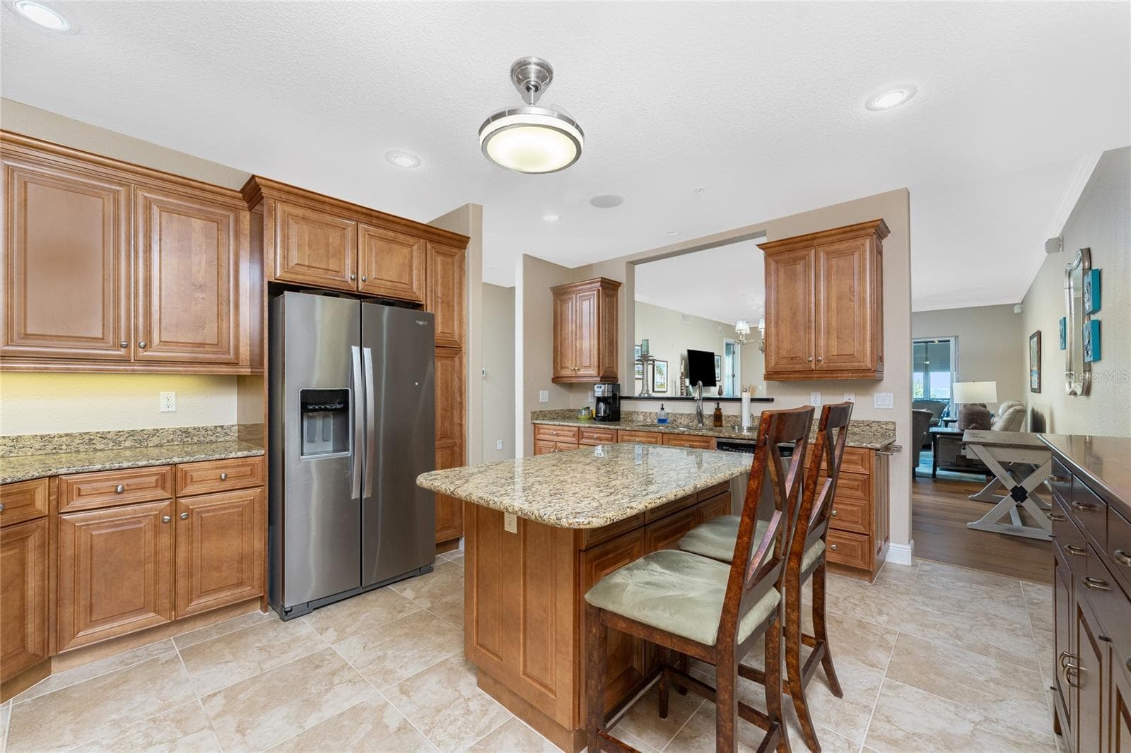 The kitchen is designed for those who love to cook with a center island - 95 N MARION CT #226, PUNTA GORDA