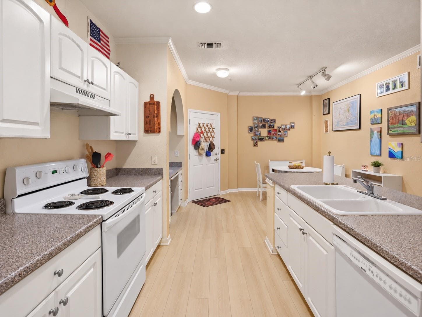Kitchen — Bright galley kitchen - 860 N ORANGE AVE #323, ORLANDO