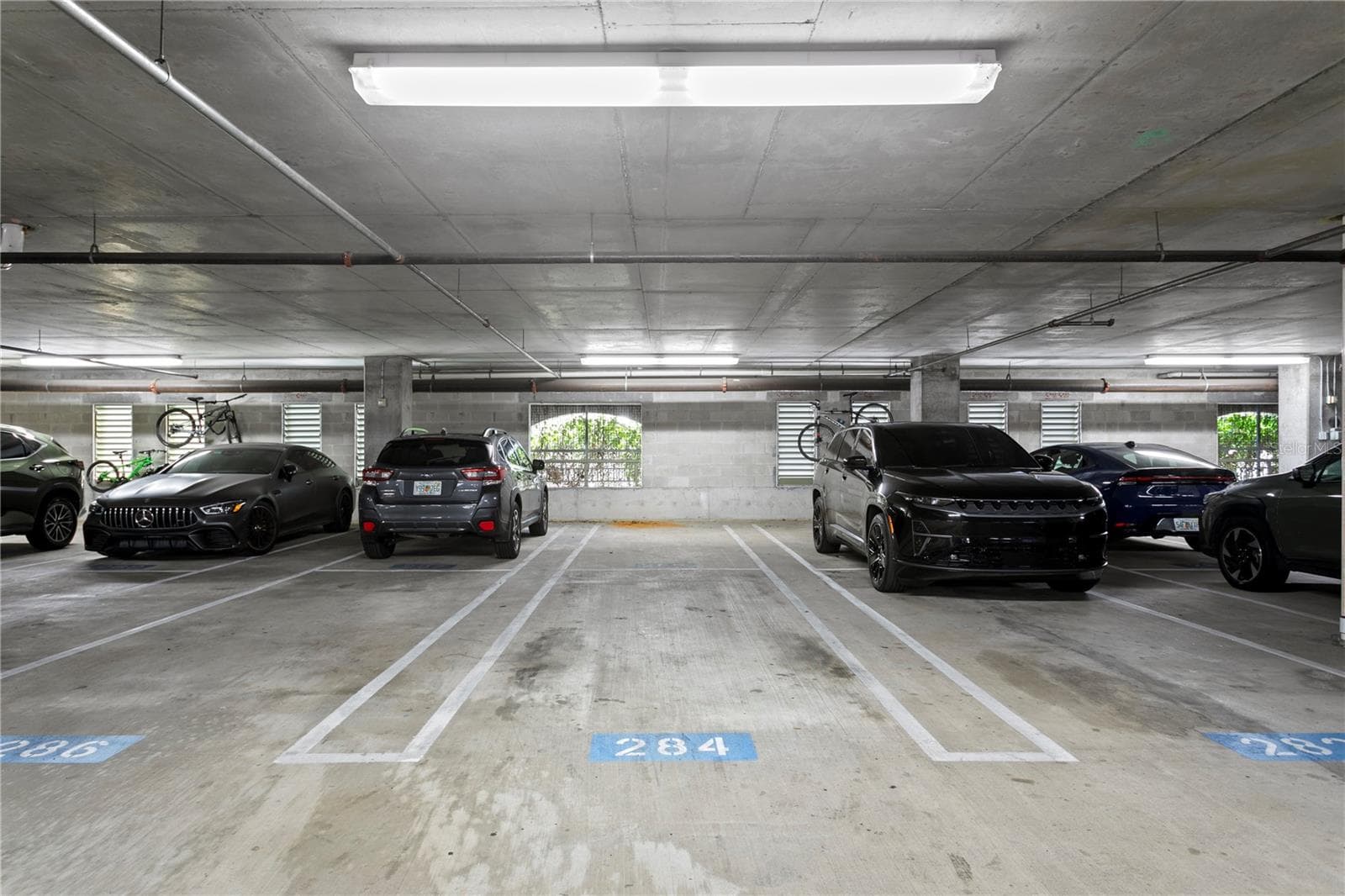 2 parking spots perfect for multiple or larger vehicles plus... - 450 KNIGHTS RUN AVE #1004, TAMPA