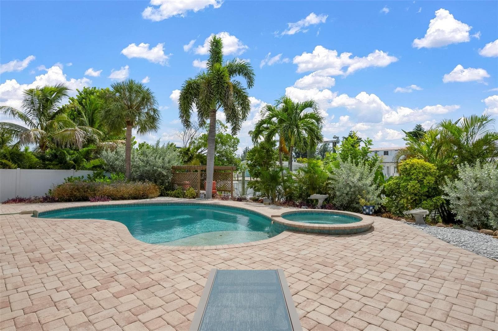 Heated saltwater pool and spa with pavered deck and southern exposure. - 503 65TH ST, HOLMES BEACH