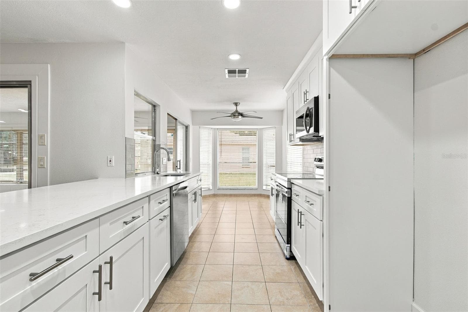 Refrigerator being installed - 9601 NOBLE CT, NEW PORT RICHEY