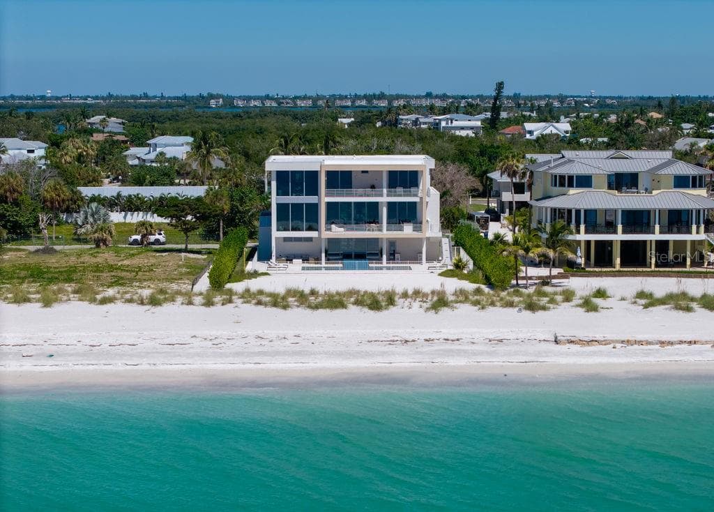 Welcome to 6489 Gulfside road on Longboat Key. Recently completed and ready for move in! Designed by DSDG Architects, built by Seaward Homes - 6489 GULFSIDE RD, LONGBOAT KEY