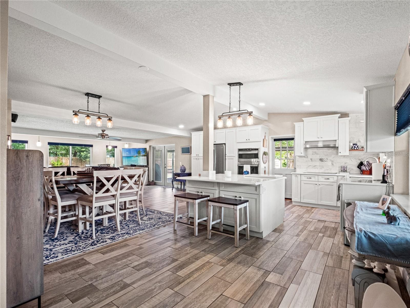 Light and bright throughout the main living areas. - 1210 CANBERRA AVE, ORLANDO