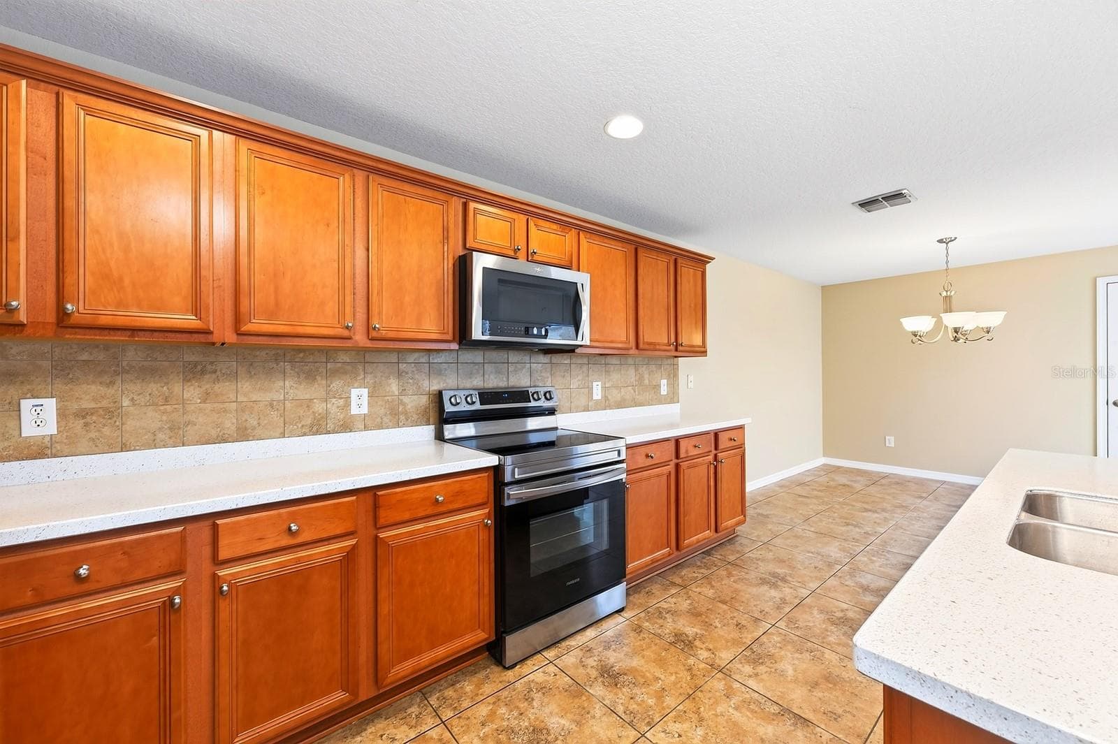 Stainless steel appliances. - 2564 ABEY BLANCO DR, ORLANDO