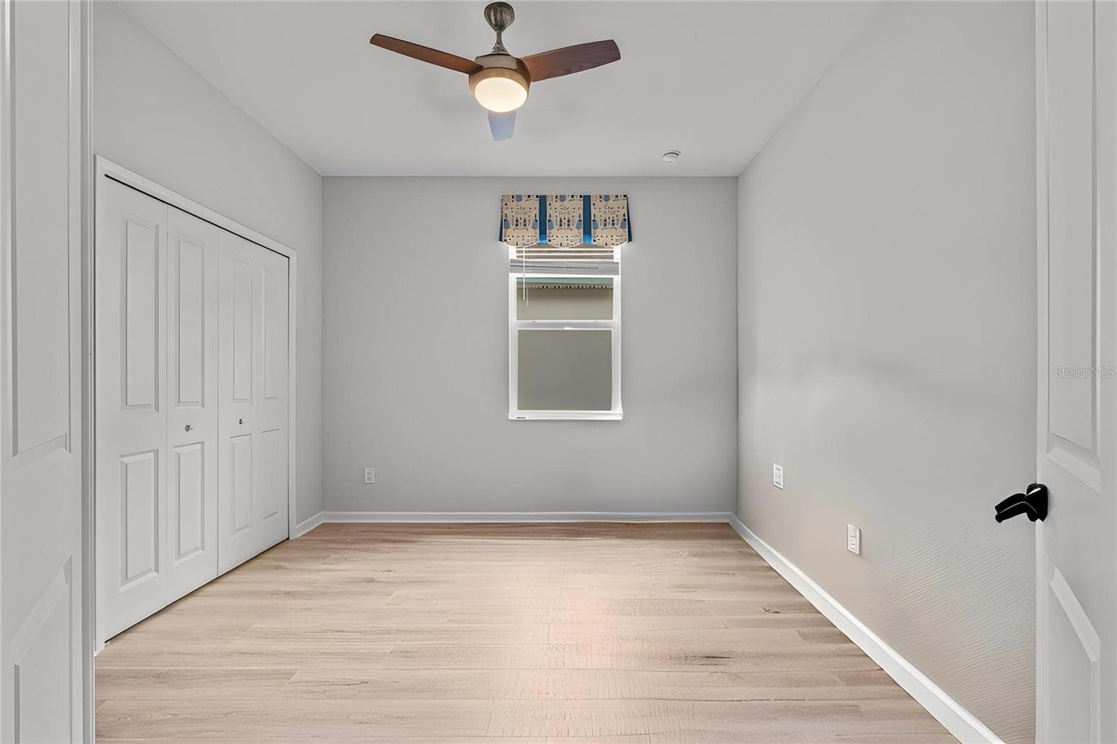 Guest Bedroom with Double Doors - 466 MARGARITAVILLE AVE, DAYTONA BEACH
