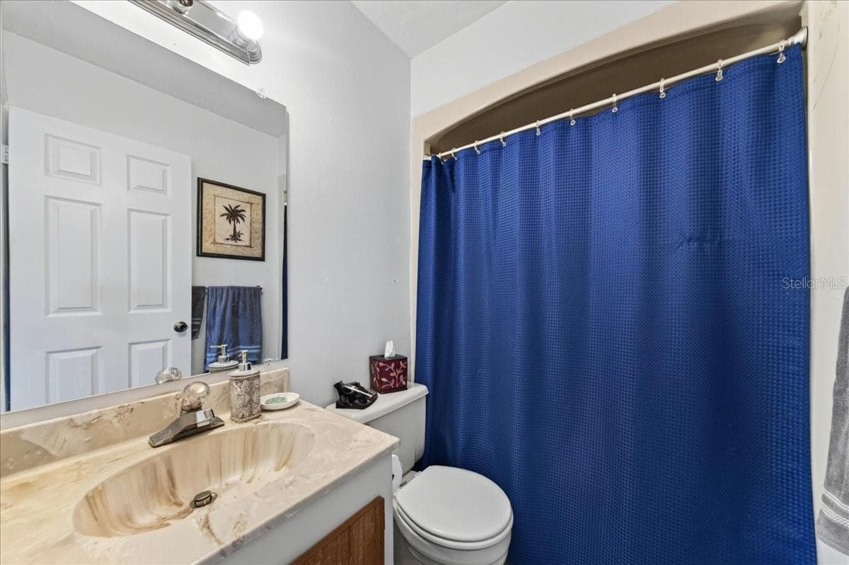 Unit 843 ensuite bathroom to bedroom 2 - 841 E 14TH AVE, NEW SMYRNA BEACH