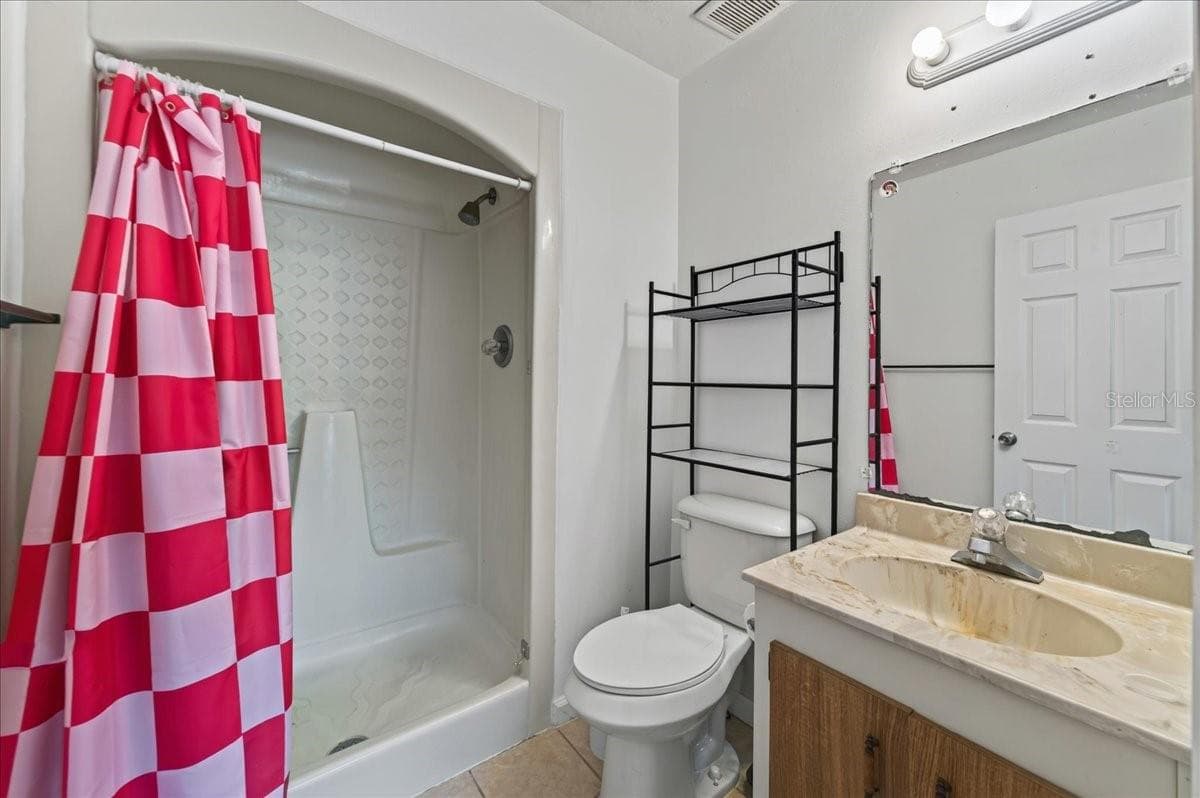 Unit 845 ensuite bathroom to bedroom 1 - 841 E 14TH AVE, NEW SMYRNA BEACH