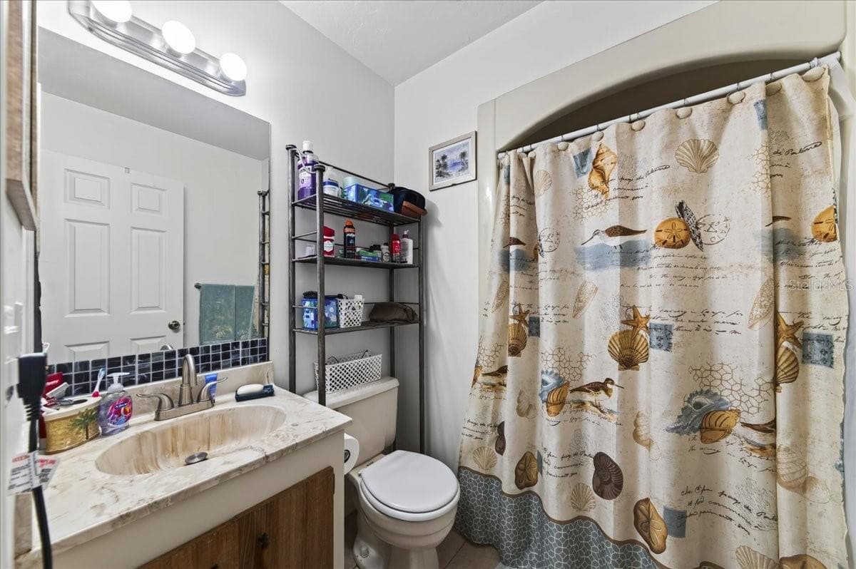 Unit 847 ensuite bathroom to bedroom 1 - 841 E 14TH AVE, NEW SMYRNA BEACH