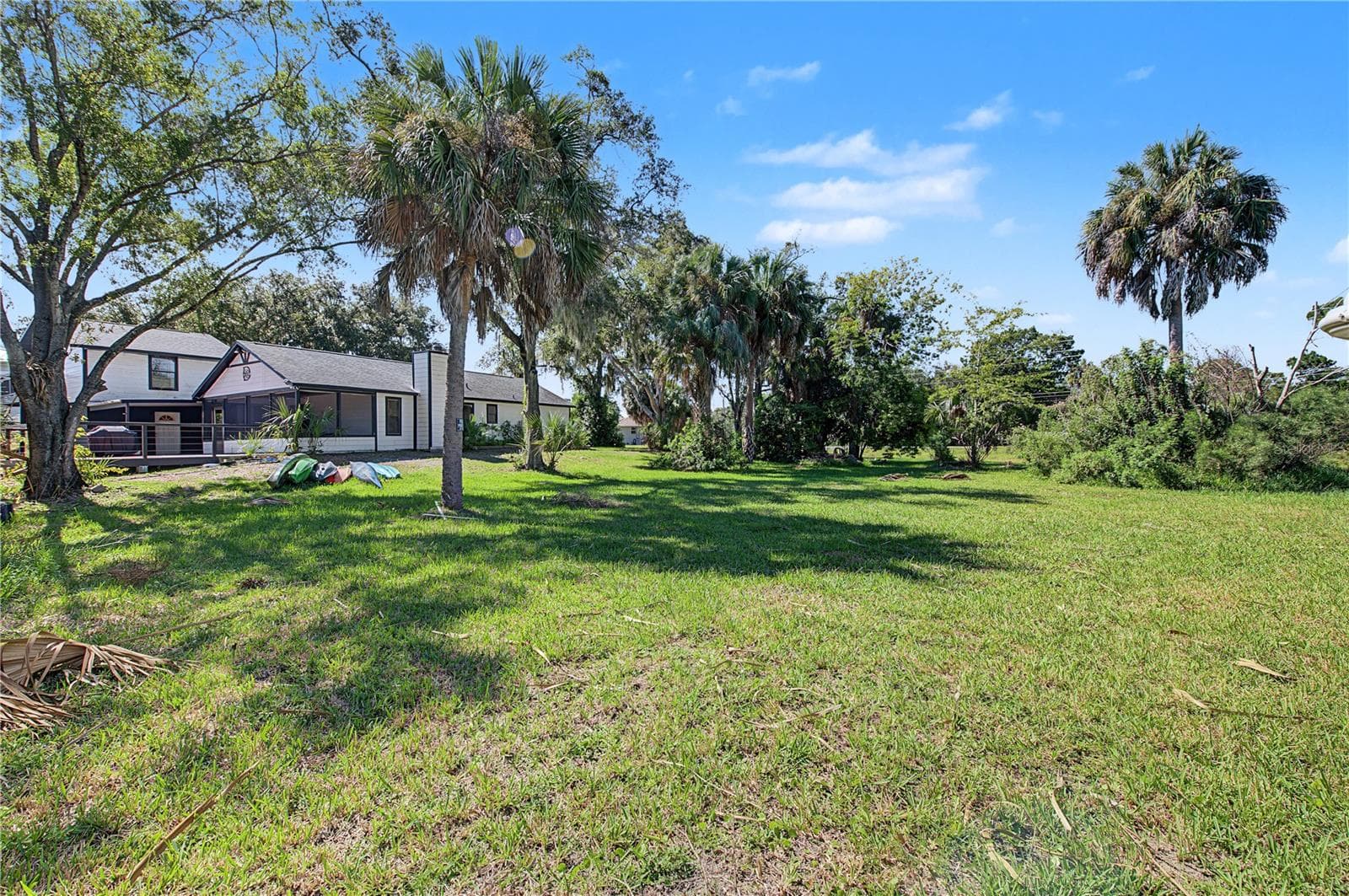 Mature palms and established trees add character to this spacious property. - 10933 W FORT ISLAND TRL, CRYSTAL RIVER