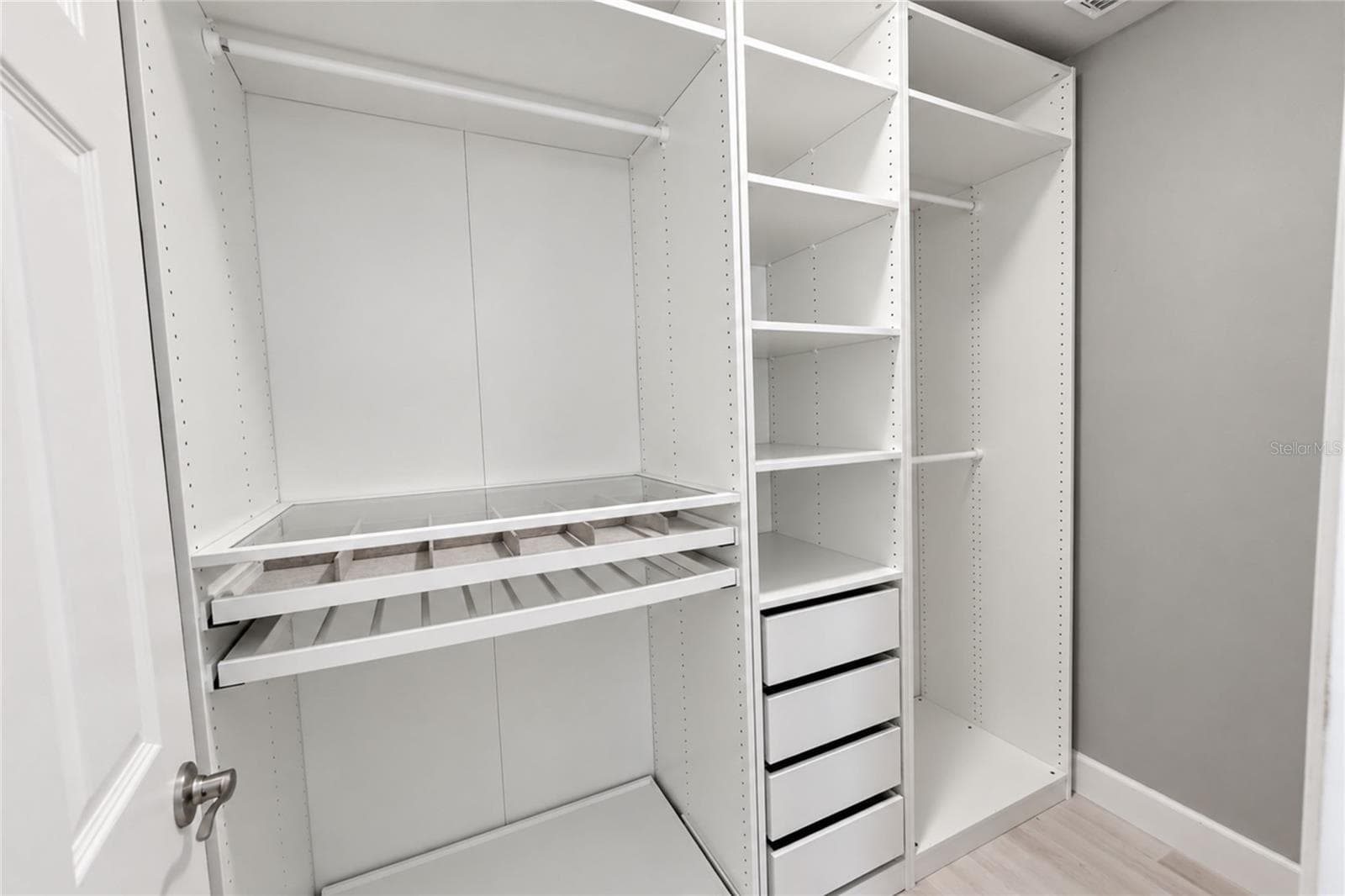 CLOSET ORGANIZER IN WALK IN CLOSET - 2014 DEXTER ST, HAINES CITY