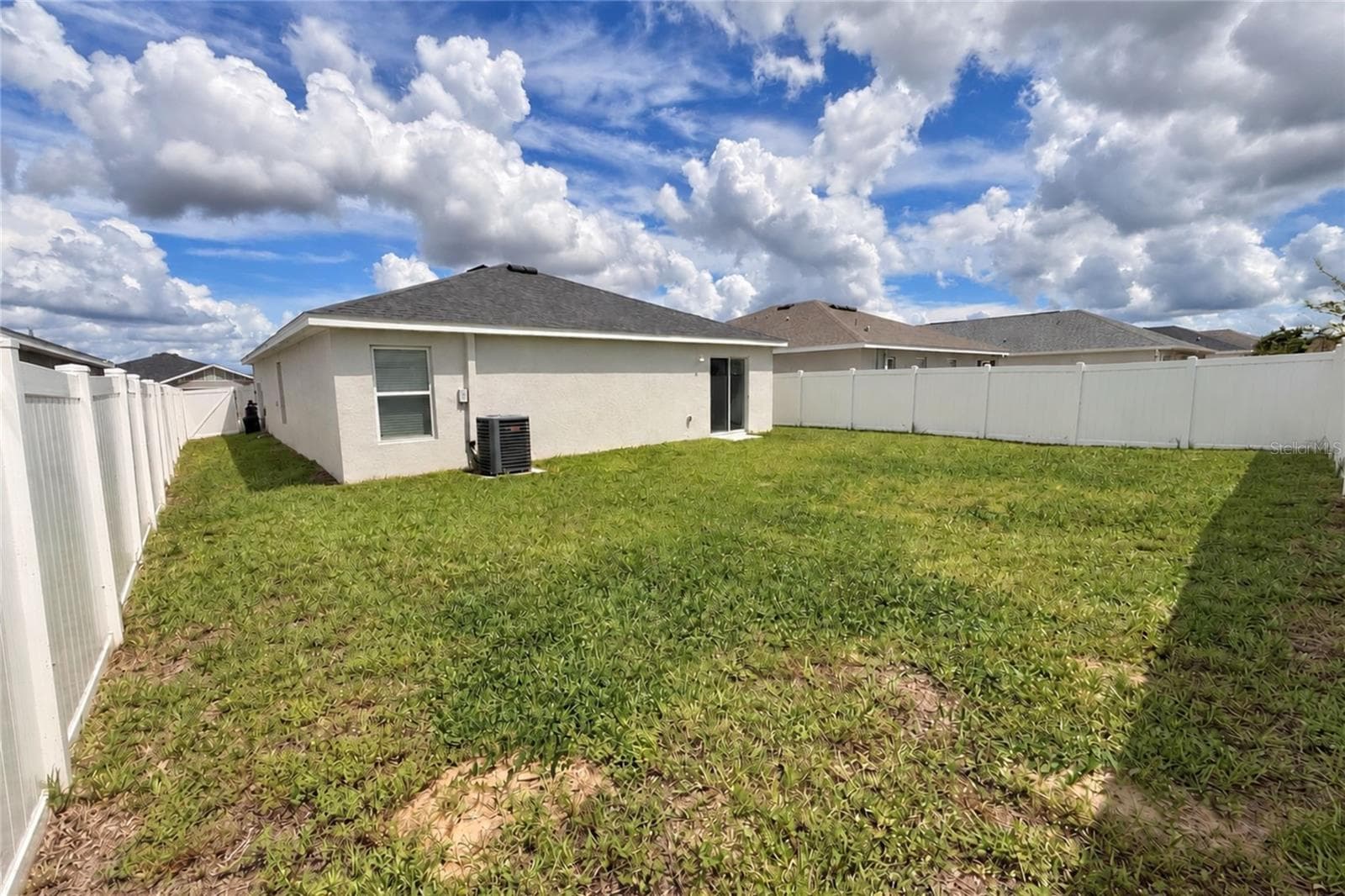 SPACIOUS BACKYARD WITH THE CONVENIENCE OF THE PRIVACY FENCE - 2014 DEXTER ST, HAINES CITY