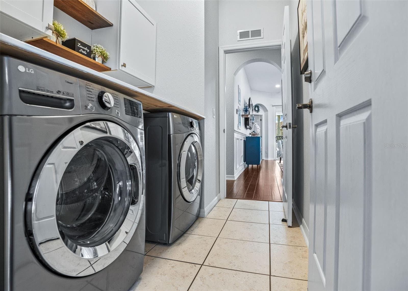 Laundry rm w/extra storage - 12056 SE 178TH ST, SUMMERFIELD