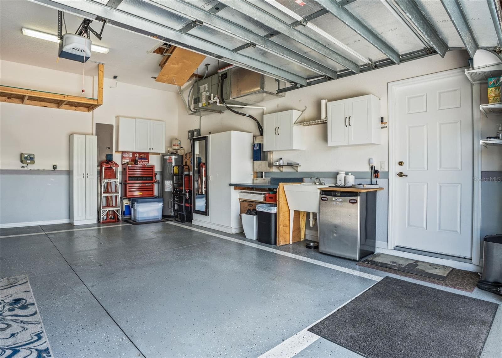 2 Car Garage w/built in cabinets - 12056 SE 178TH ST, SUMMERFIELD