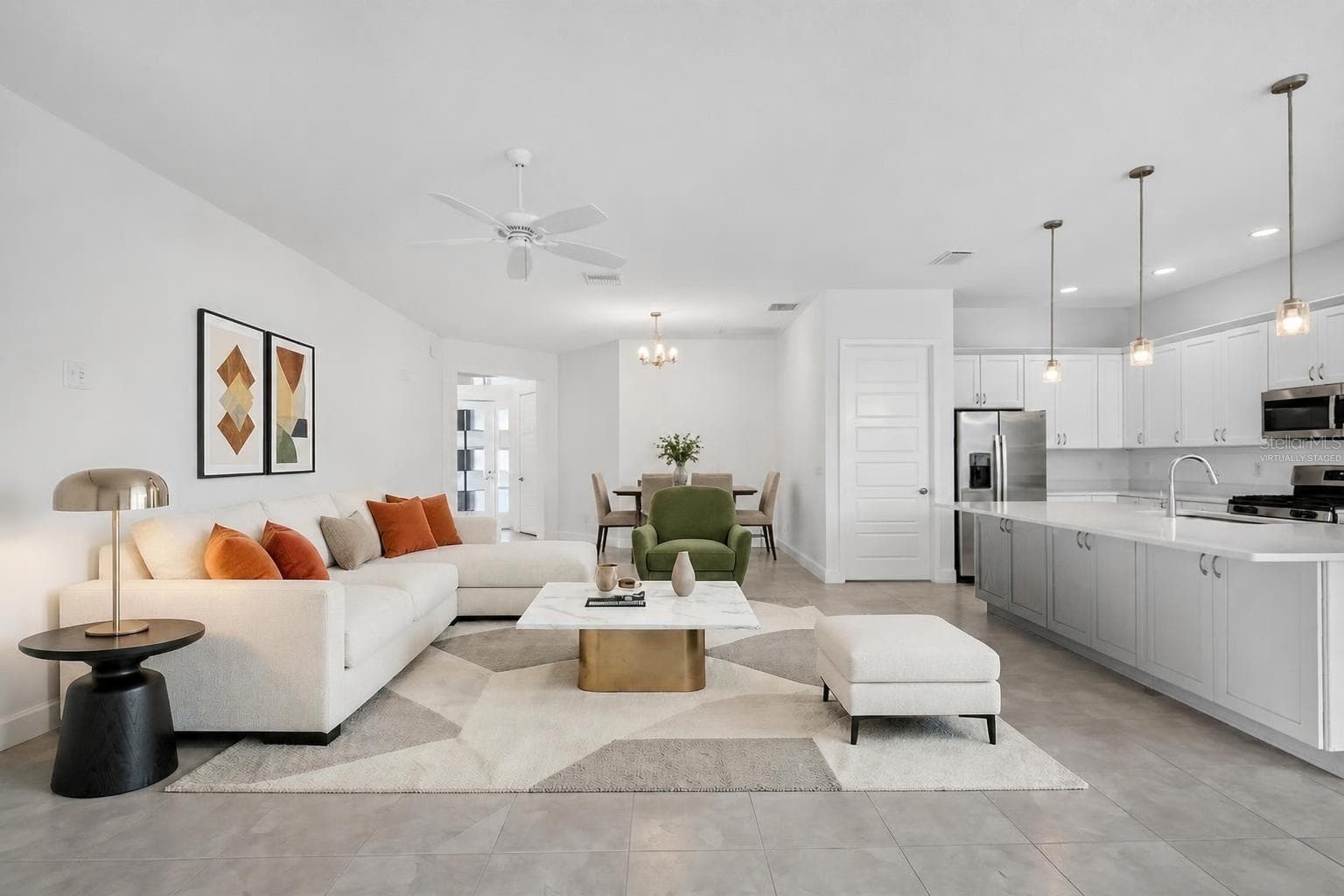 Living, Dining, and Kitchen -Virtually Staged - 654 SHIVERS LOOP, THE VILLAGES