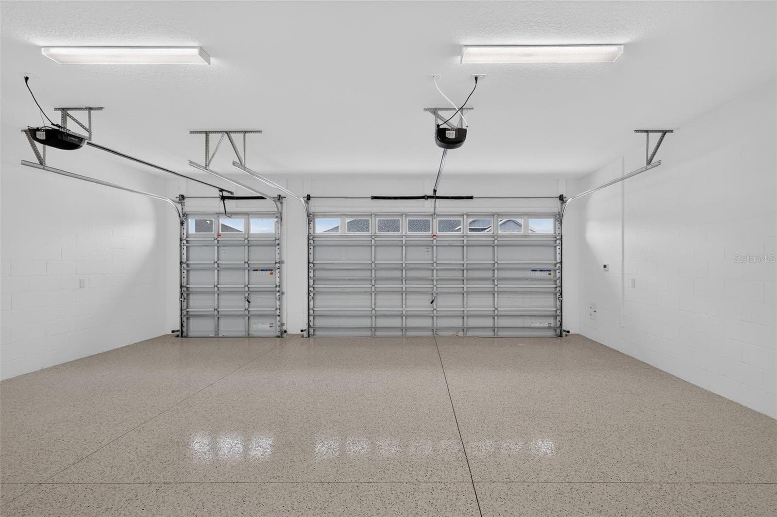 EXPANSIVE 28'x30' Two-Car + GOLF CART Garage - 654 SHIVERS LOOP, THE VILLAGES