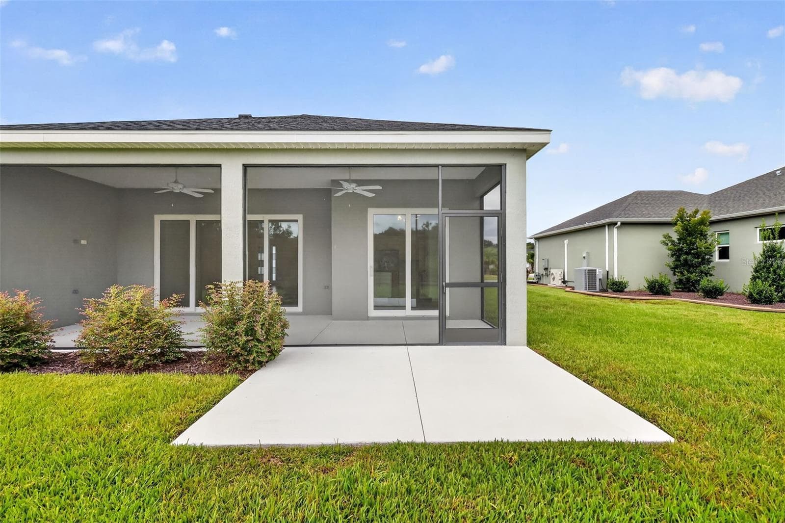 Extended Rear Patio - 654 SHIVERS LOOP, THE VILLAGES