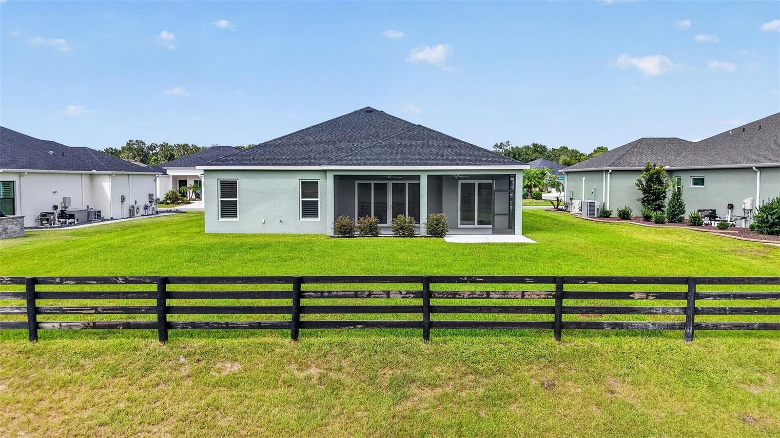 Rear Elevation with Spacious Rear Yard and ROOM FOR A POOL! - 654 SHIVERS LOOP, THE VILLAGES
