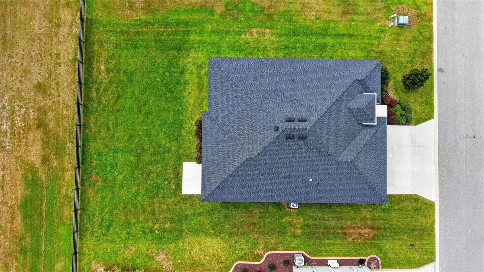 Aerial Side Elevation with Spacious Rear Yard and ROOM FOR A POOL! - 654 SHIVERS LOOP, THE VILLAGES