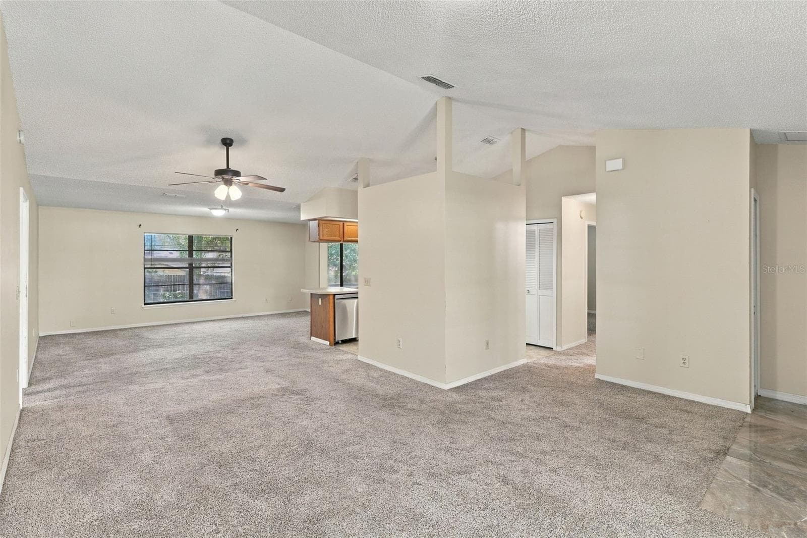 Living Room to Dinning Room and Kitchen - 1249 HOWLAND BLVD, DELTONA
