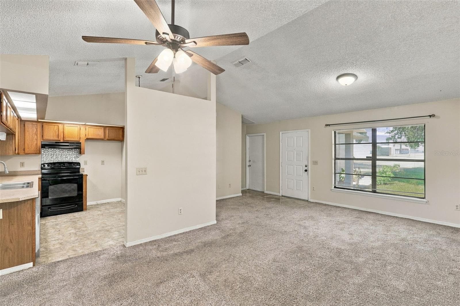 Dinning Room to Kitchen - 1249 HOWLAND BLVD, DELTONA