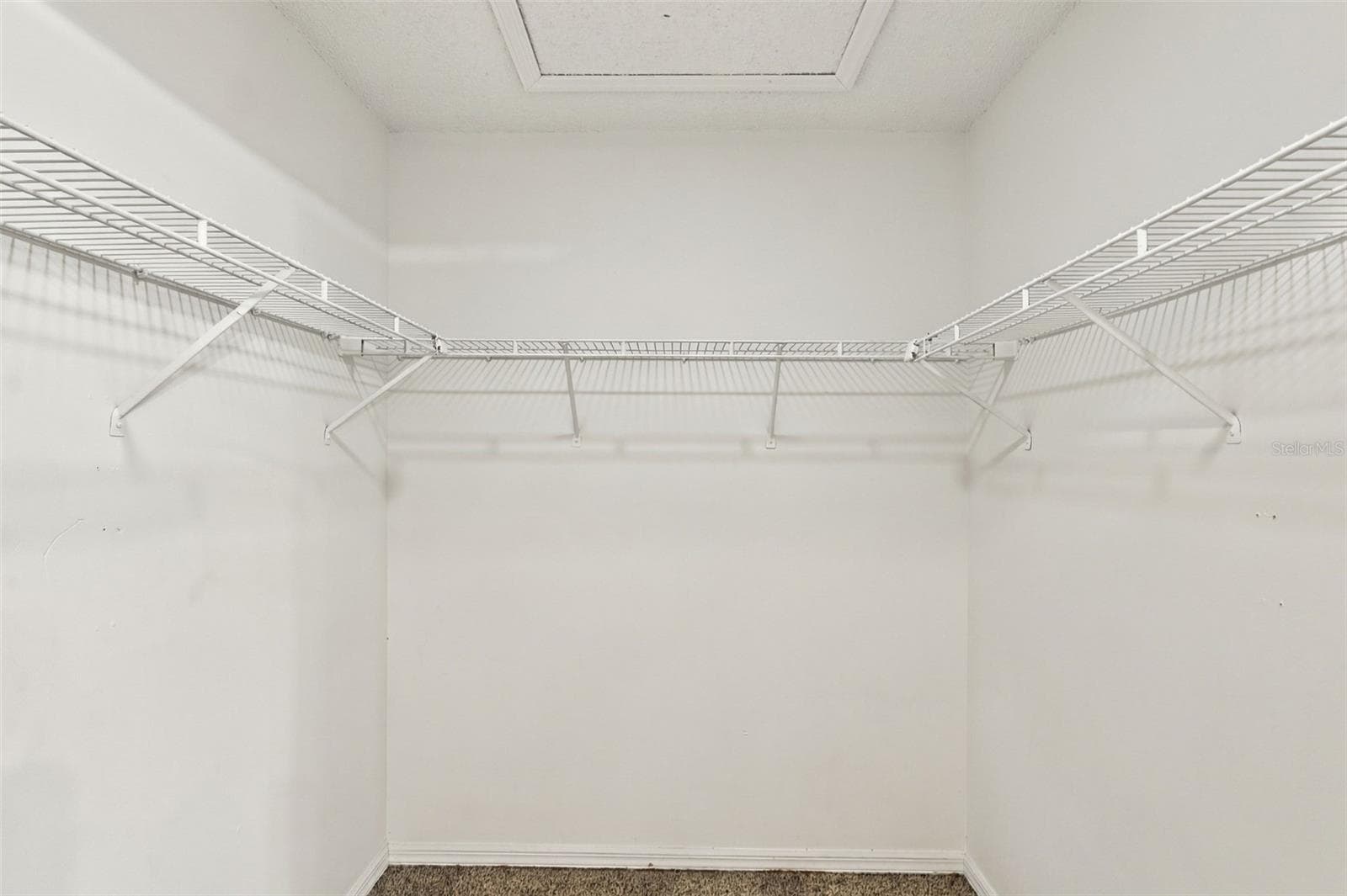 Primary Bedroom Walk in Closet - 1249 HOWLAND BLVD, DELTONA