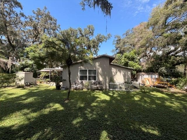 Single Family Residence at 11615 GROVEWOOD AVE, THONOTOSASSA, photo 6 of 29
