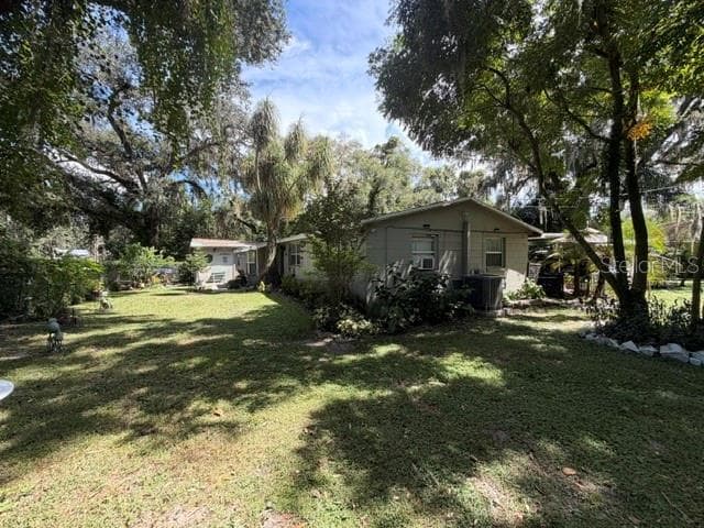 Single Family Residence at 11615 GROVEWOOD AVE, THONOTOSASSA, photo 11 of 29