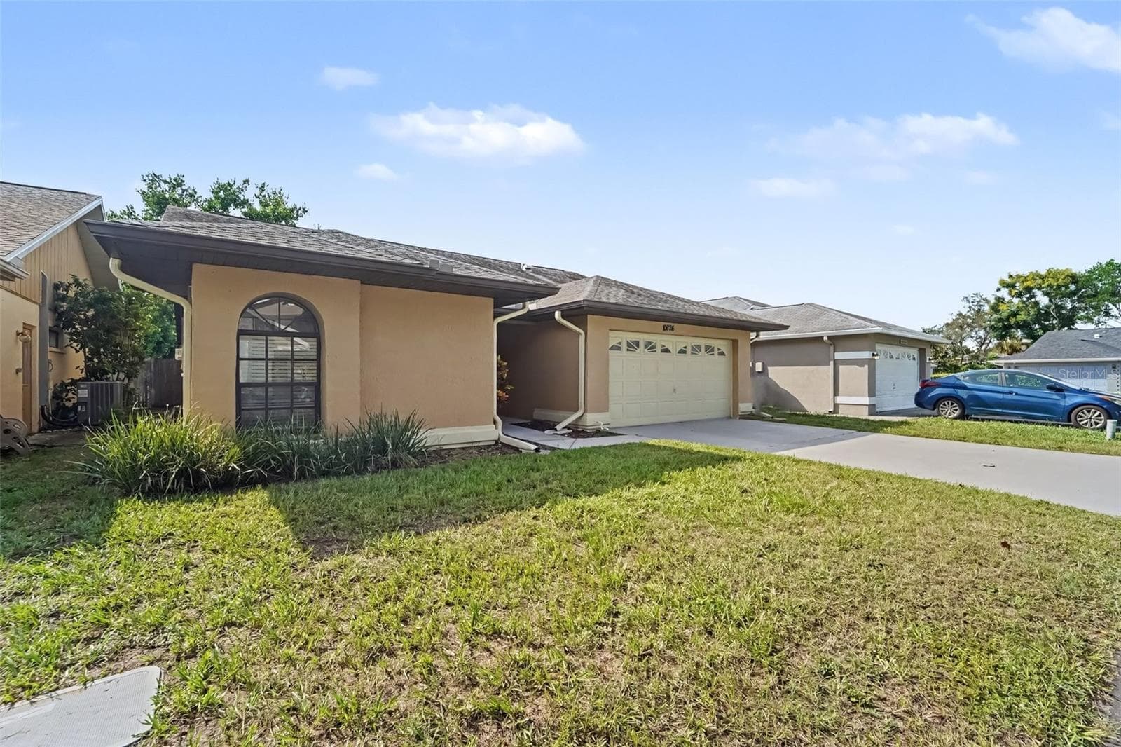 Single Family Residence at 10826 CLAYMONT DR, NEW PORT RICHEY, photo 2 of 19
