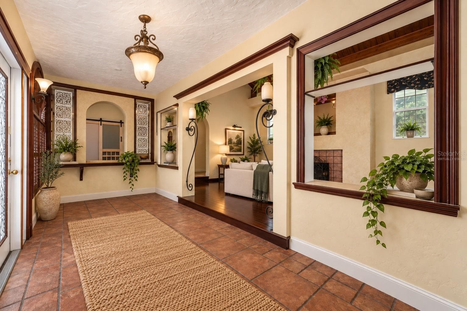 VIRTUALLY STAGED - MAIN HOUSE ENTRANCE - 815 LAKE JESSIE DR, WINTER HAVEN