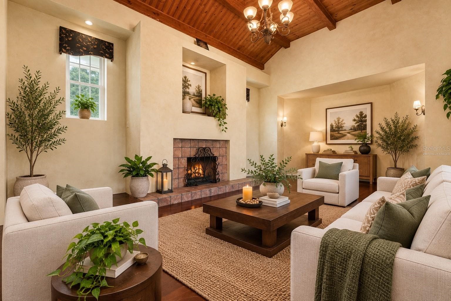 VIRTUALLY STAGED - MAIN HOUSE LIVING/WOOD FIREPLACE ROOM - 815 LAKE JESSIE DR, WINTER HAVEN