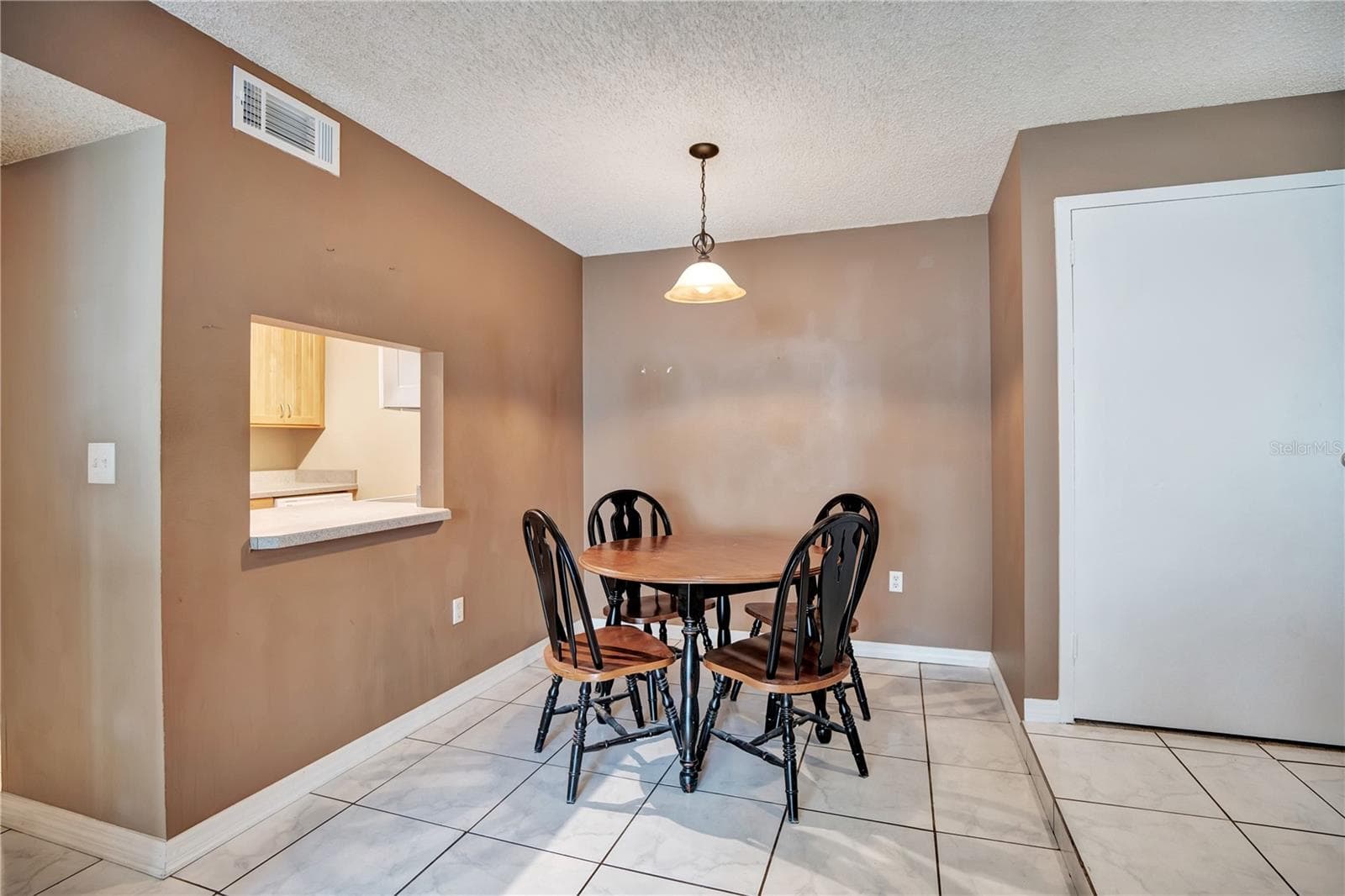 Dining Area Staged - 3278 S SEMORAN BLVD #12, ORLANDO