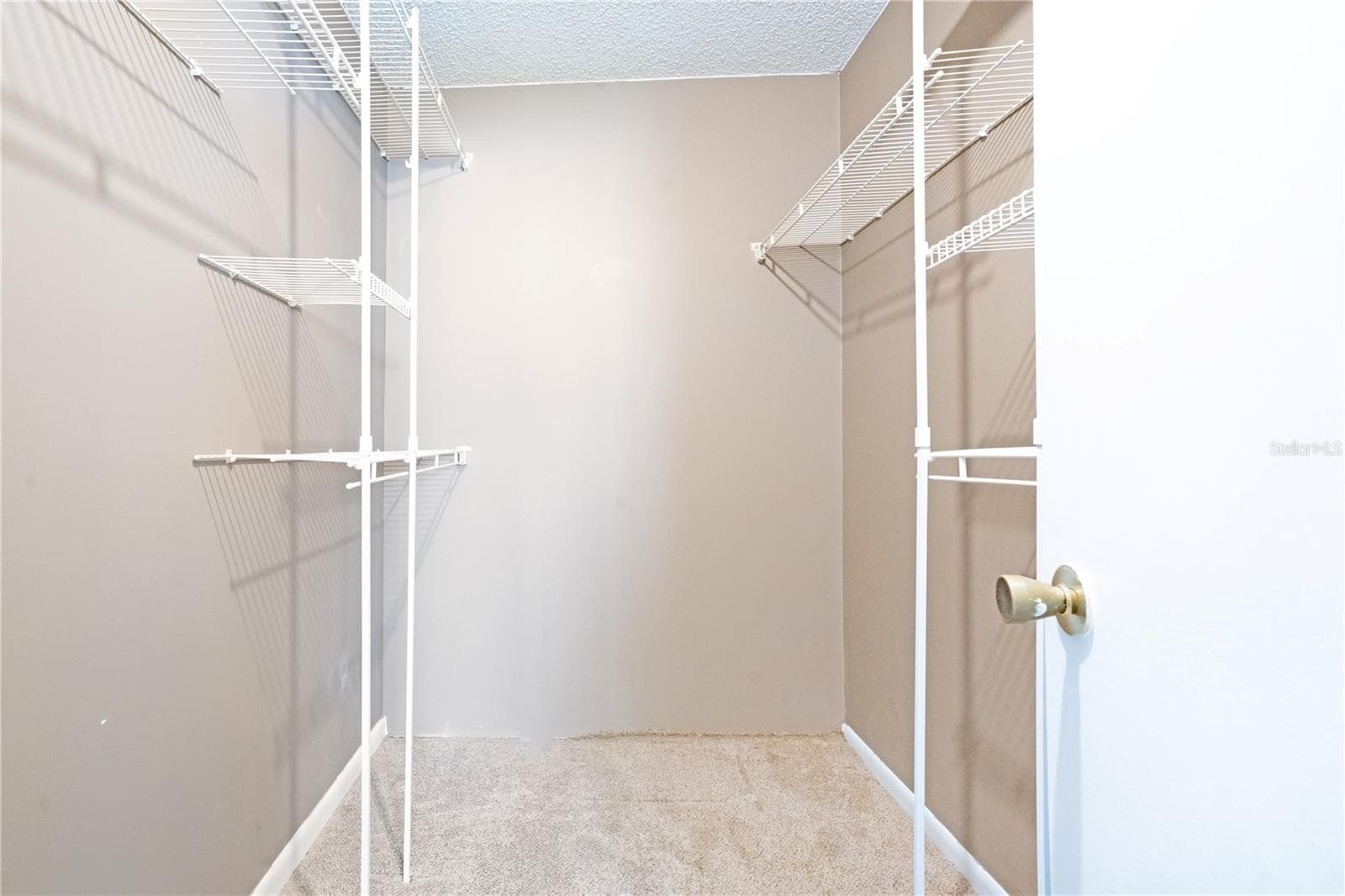 Primary Bedroom Walk-In Closet - 3278 S SEMORAN BLVD #12, ORLANDO