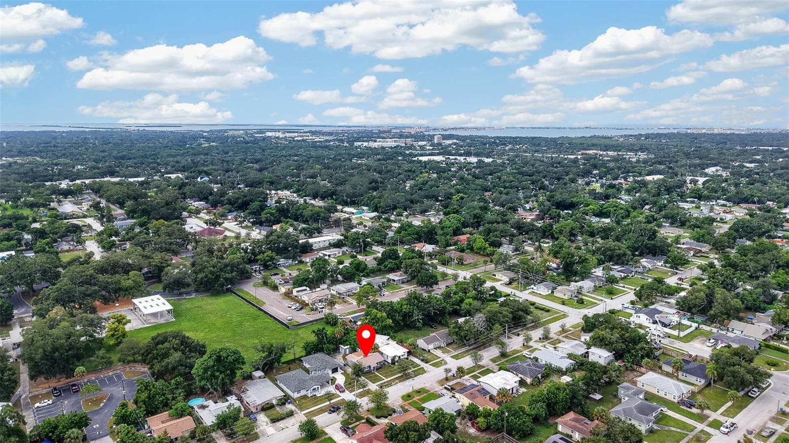 Aerial view of property and surrounding neighborhood the property location is marked with a red pin - 2452 17TH AVE S, ST PETERSBURG