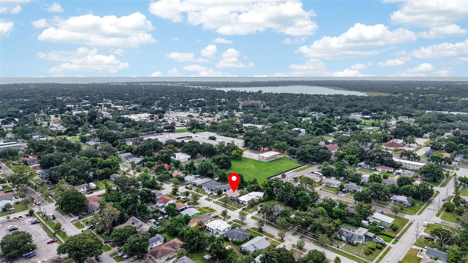 Aerial view of property and surrounding neighborhood the property location is marked with a red pin - 2452 17TH AVE S, ST PETERSBURG