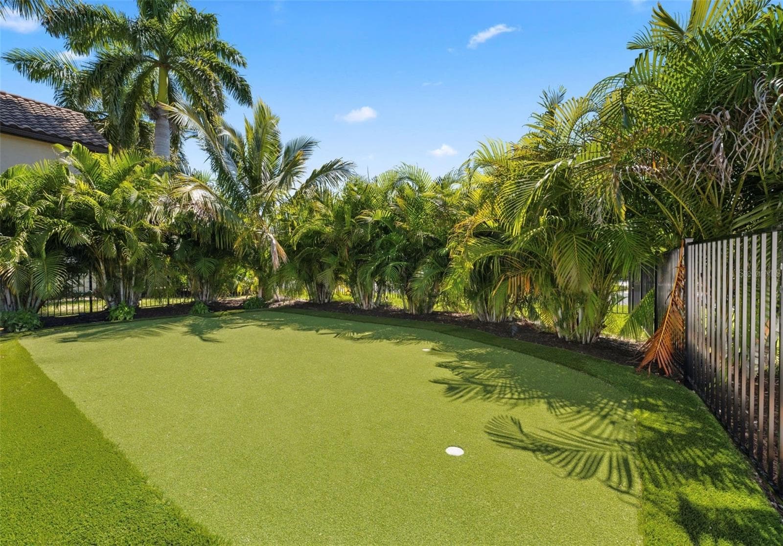 Another view of putting green. - 3360 BAYOU SOUND, LONGBOAT KEY