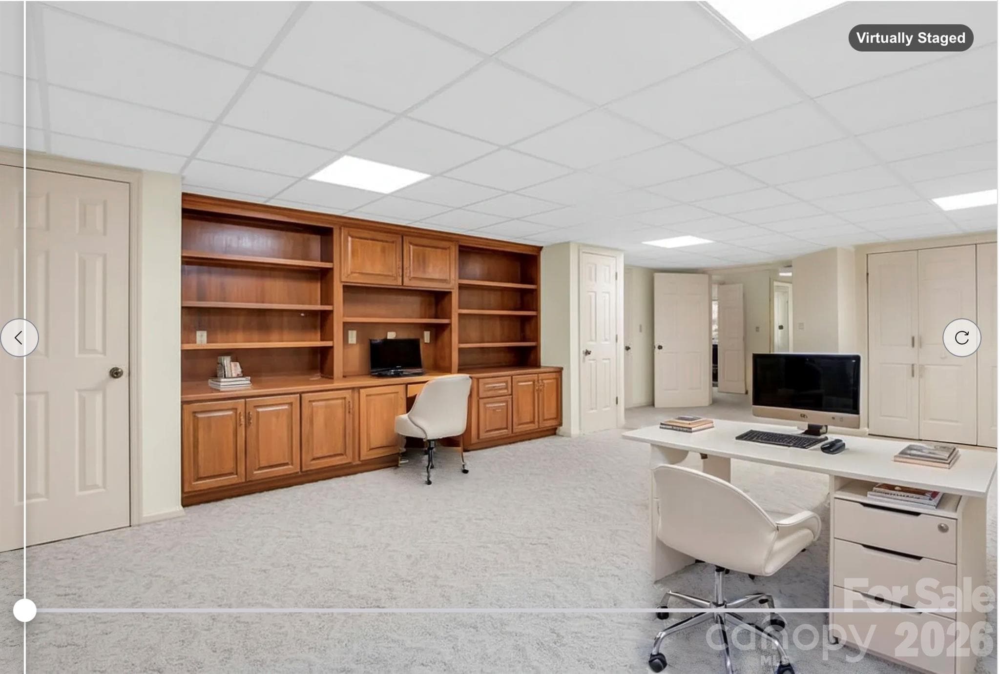 Virtually Staged - Lower Level Office with built-ins - 115 Woodhaven Drive, Hendersonville