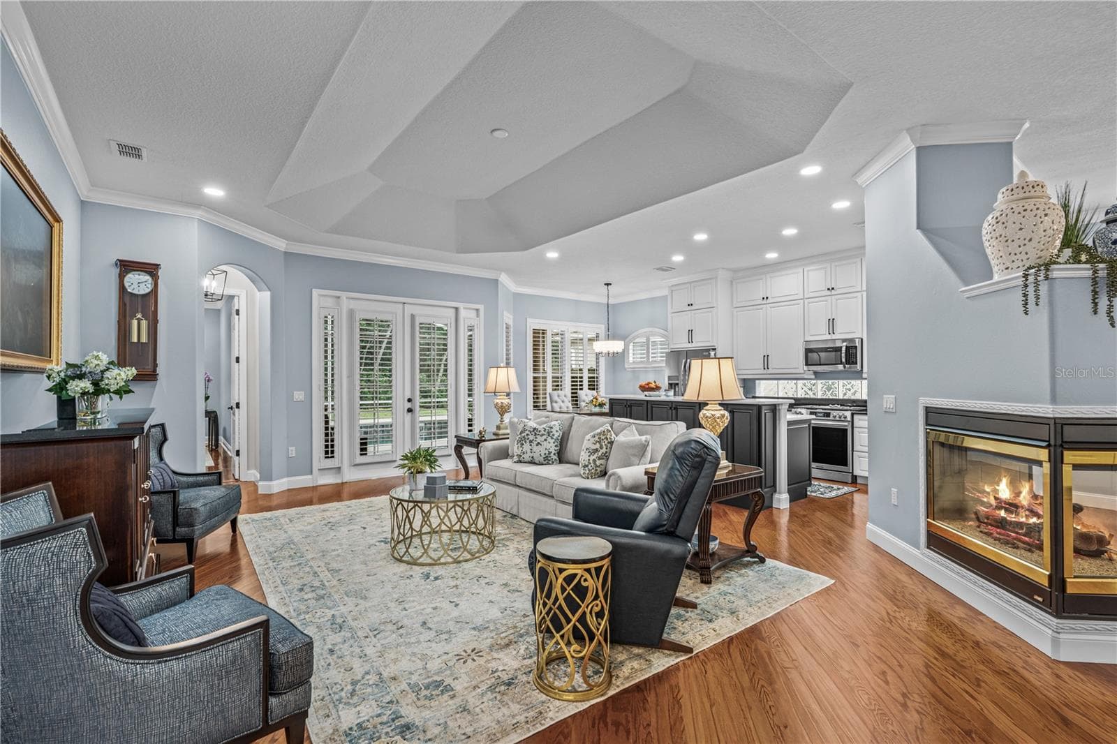 Great room which is open to the kitchen with French doors out to the lanai - 520 SOTHEBY WAY, DEBARY